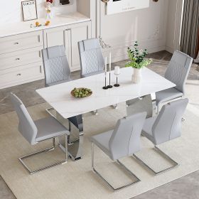 Table and chair set.63*31.4 Inch Snow Mountain White Sintered Stone Dining Table Set - 6 Light Gray High-quality PU Chairs With Arched Metal Legs.Perf